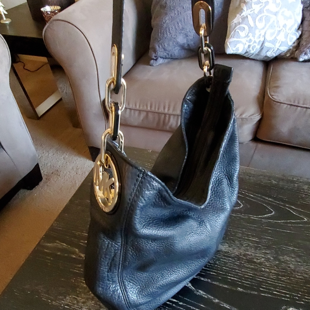Michael Kors black shoulder bag.